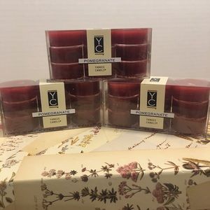 Yankee candles, 3 boxes with 9 tea lights per box.